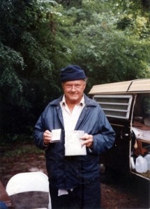 Will McLean standing beside the van he used to travel around the state writing songs about his Florida sand